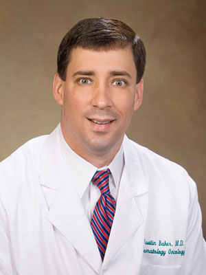 Headshot of Justin Tyler Baker, MD, specializing in Medical Oncology.